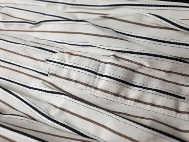 Lüks erkek kıyafetleri ve farklı malzemeler.