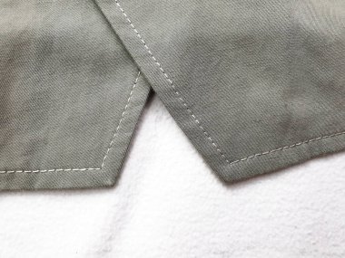 Lüks erkek kıyafetleri ve farklı malzemeler.