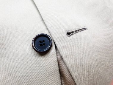 Lüks erkek kıyafetleri ve farklı malzemeler.