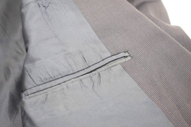 Lüks erkek kıyafetleri ve farklı malzemeler.