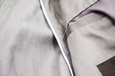 Lüks erkek kıyafetleri ve farklı malzemeler.