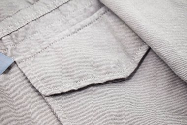 Lüks erkek kıyafetleri ve farklı malzemeler.