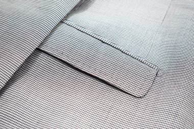 Lüks erkek kıyafetleri ve farklı malzemeler.