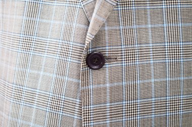 Lüks erkek kıyafetleri ve farklı malzemeler.