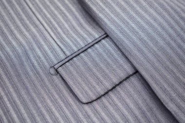 Lüks erkek kıyafetleri ve farklı malzemeler.