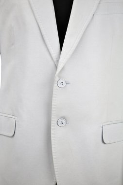 Lüks erkek kıyafetleri ve farklı malzemeler.