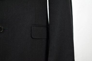 Lüks erkek kıyafetleri ve farklı malzemeler.