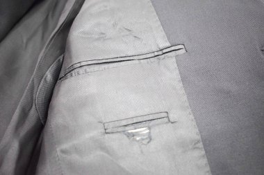 Lüks erkek kıyafetleri ve farklı malzemeler.