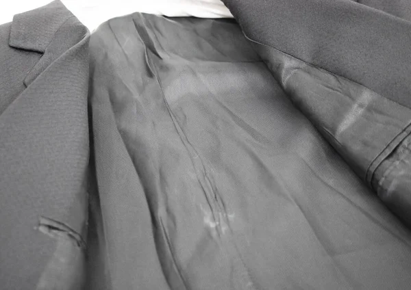 Lüks erkek kıyafetleri ve farklı malzemeler.