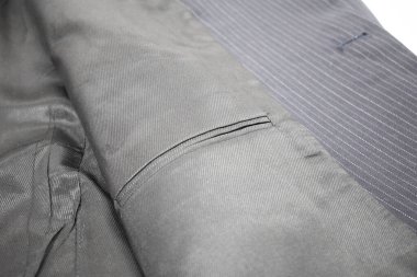 Lüks erkek kıyafetleri ve farklı malzemeler.