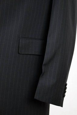 Lüks erkek kıyafetleri ve farklı malzemeler.