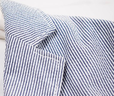 Lüks erkek kıyafetleri ve farklı malzemeler.