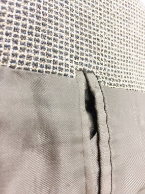 Lüks erkek kıyafetleri ve farklı malzemeler.