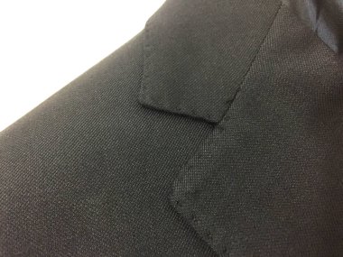 Lüks erkek kıyafetleri ve farklı malzemeler.