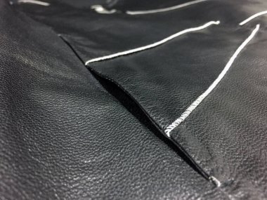 Lüks erkek kıyafetleri ve farklı malzemeler.