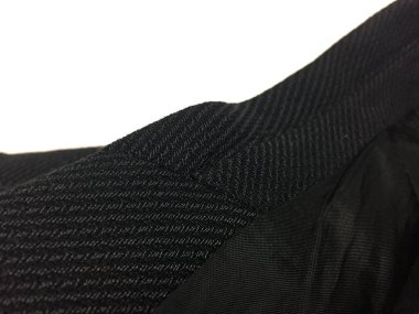 Lüks erkek kıyafetleri ve farklı malzemeler.