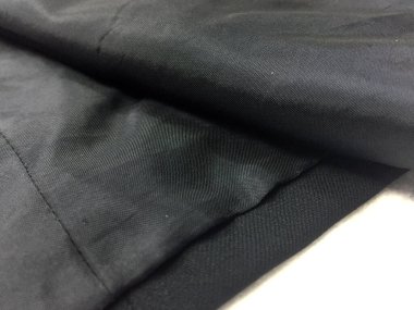 Lüks erkek kıyafetleri ve farklı malzemeler.