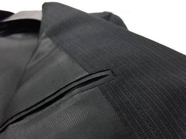 Lüks erkek kıyafetleri ve farklı malzemeler.