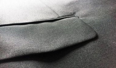 Lüks erkek kıyafetleri ve farklı malzemeler.