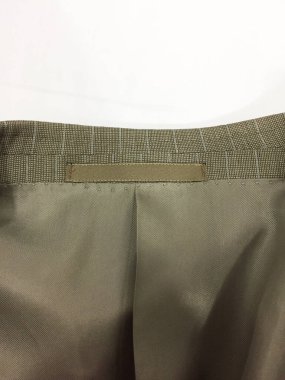 Lüks erkek kıyafetleri ve farklı malzemeler.