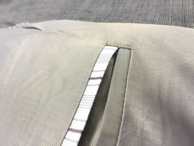 Lüks erkek kıyafetleri ve farklı malzemeler.