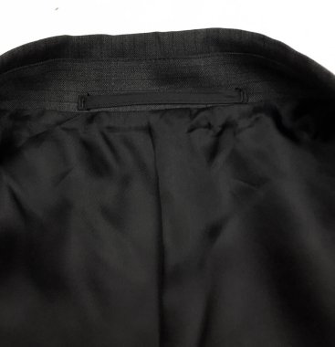 Lüks erkek kıyafetleri ve farklı malzemeler.