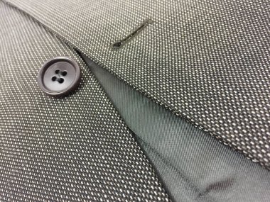 Lüks erkek kıyafetleri ve farklı malzemeler.