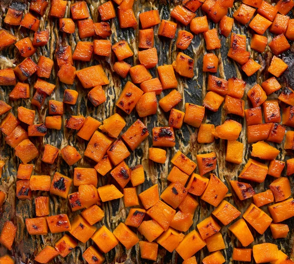 Top View Roasted Butternut Squash Cut Small Pieces Textured Roasted — Photo