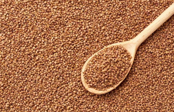 Wooden Spoon Buckwheat Porridge Close Texture Raw Buckwheat — ストック写真