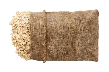 Yulaf gevrekleri torba torbasının içinde, üstü açık, yulaf ezmesi düzlüklü. .