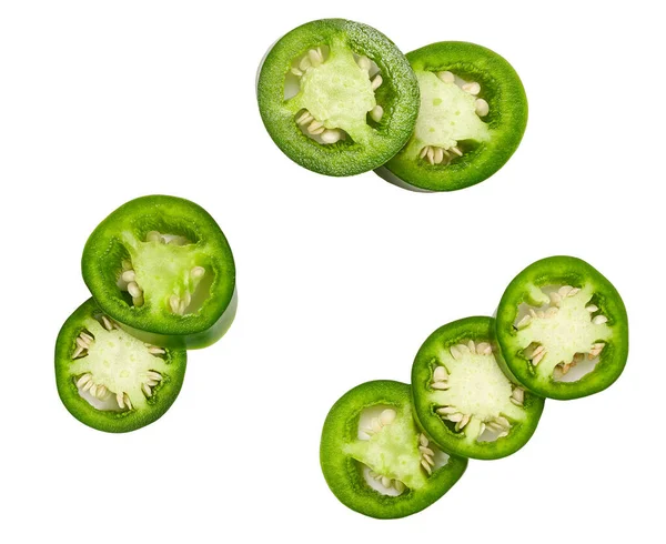 green jalapeno chili pepper cut in pieces  isolated on white background top view.