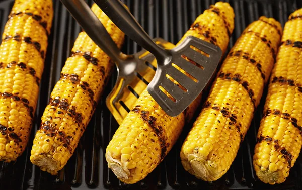 grilled corn traditional street food. Delicious grilled corn. Mexican food. Ideas for barbecues and grill parties.