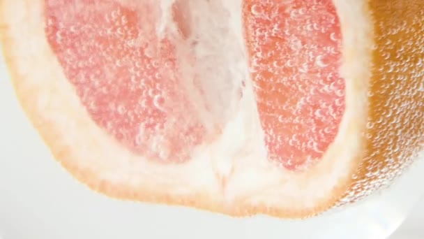 Grapefruit Close Sizzles Floats Surface Halves Pink Grapefruit Fall Water — Stock Video