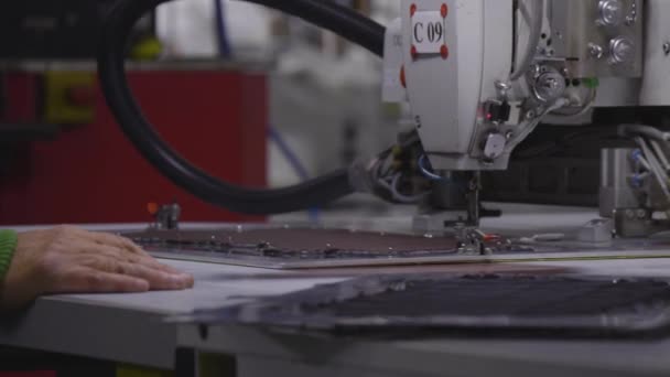 The machine sews products at the factory — Stock Video