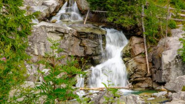 Waterfalls at stream Studeny potok in High Tatras mountains during summer, Slovakia.
