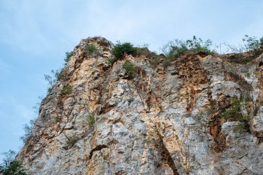 Rock mountain scene and blue sky background.