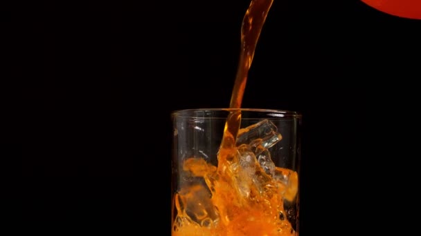 Slow Motion Orange Juice Pouring Glass Close Black Background — Stockvideo