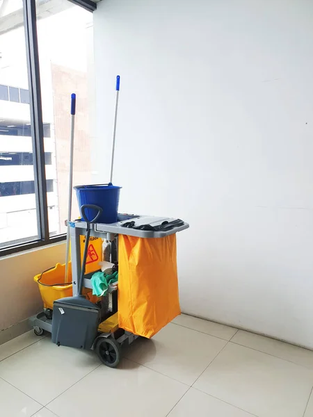 janitorial, cleaning equipment and tools for floor cleaning at the airport terminal with copy space.