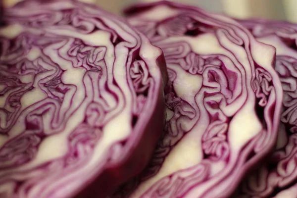 raw purple cabbage slices selective focus, raw purple cabbage slices close up kitchen photo concept idea