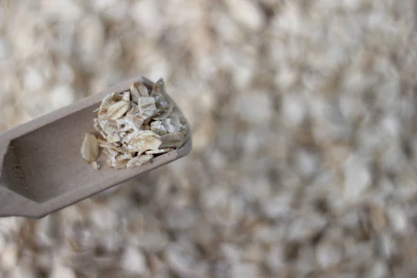 Oats Selective Focus Light Brown Wooden Spoon Oats Particles Blurred — Stock Photo, Image