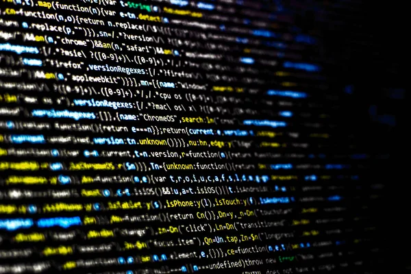 Renkli kod arka planı. Bilgisayar ekranında sıkıştırılmış javascript kodu. Yazılım geliştirici kodlama ekranı