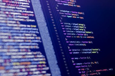 Software developer doing css coding. Compiling css in console. Color Code can be used as background.