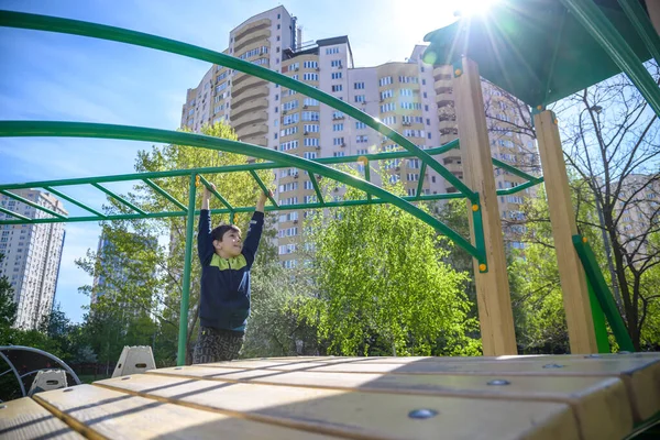 Teenager Boy Climbing Kid Playground Outdoor Climber Trains Simulator Street — 스톡 사진