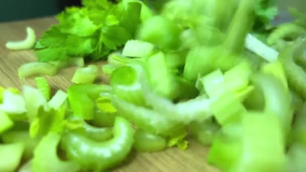 Asian cuisine vietnamese hot salad sao the whole exact cooking process from slicing to frying celery leeks pork or beef and cilantro it is very tasty all this cuts with a knife sip and interfere with — Stock Video