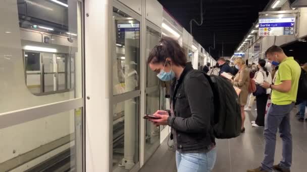 RER train in Paris station and masked men have not yet canceled oil regime 16.04.22 Paris France — Video