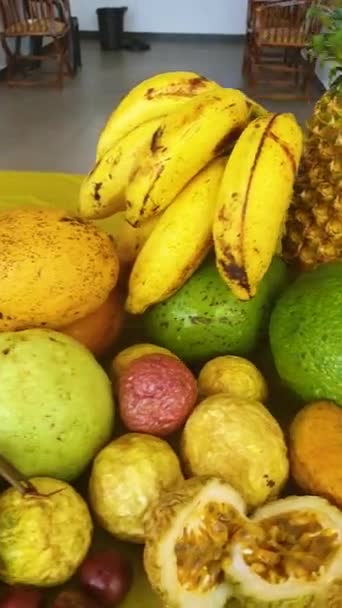 Camera Pans Fruits Soursop Rambutan Mango Pineapple Bananas Passion Fruit — Stock Video