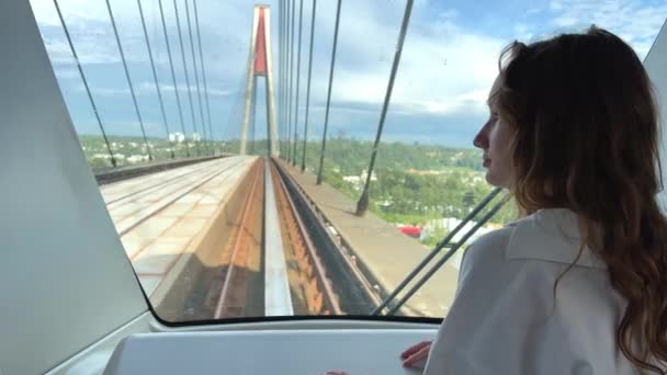 European Girl Blond Long Hair White Shirt Rides Skytrain High — Stockvideo