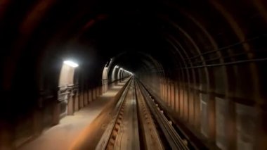 The road in the tunnel from Surrey to Vancouver Canada with slow motion you can see the walls are broken old and dark can be a horror movie. High quality 4k footage
