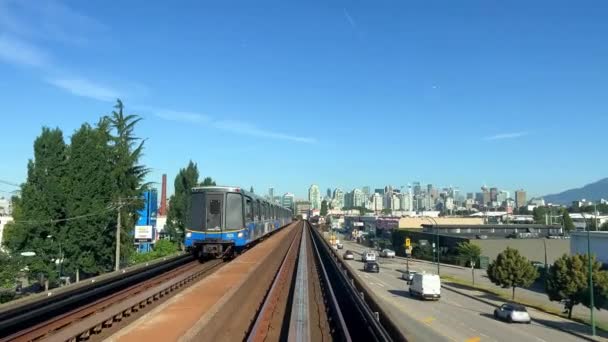 Train Traveling Road Another Skytrain Coming Front Window Driverless Subway — стоковое видео