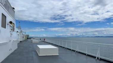 The upper deck of the ship is visible the snow-white part of the ship and the blue sky blue sea depth relaxation calm almost no people very beautiful and quiet on the sea Calm. High quality 4k footage